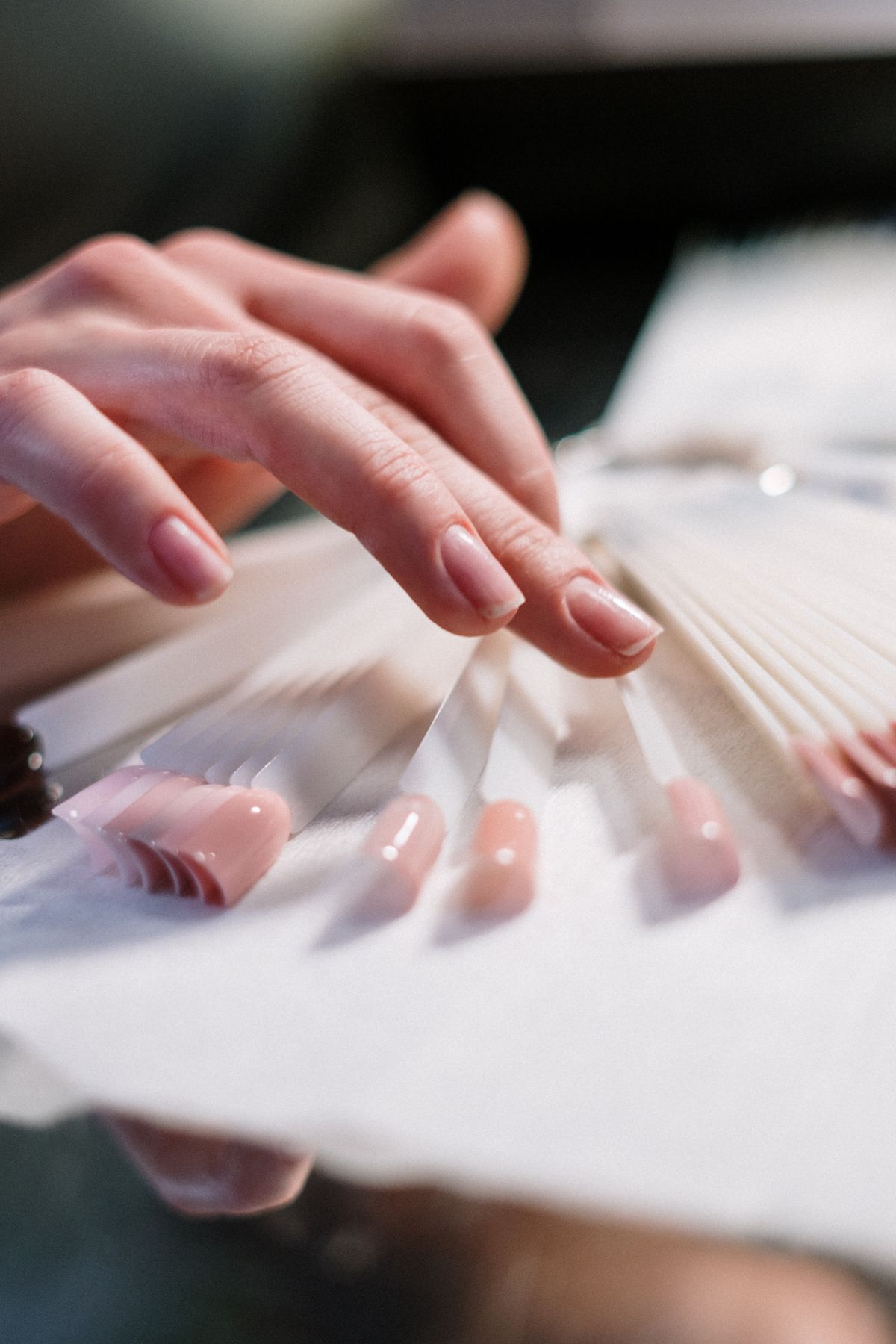Choosing a gel color from nail swatches
